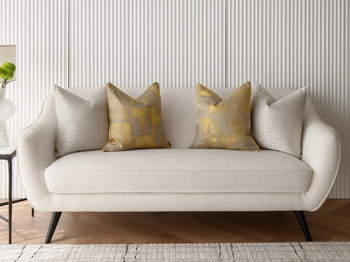 Gustave Bundle cushion in silver and gold, shown in a lifestyle front view as image 4