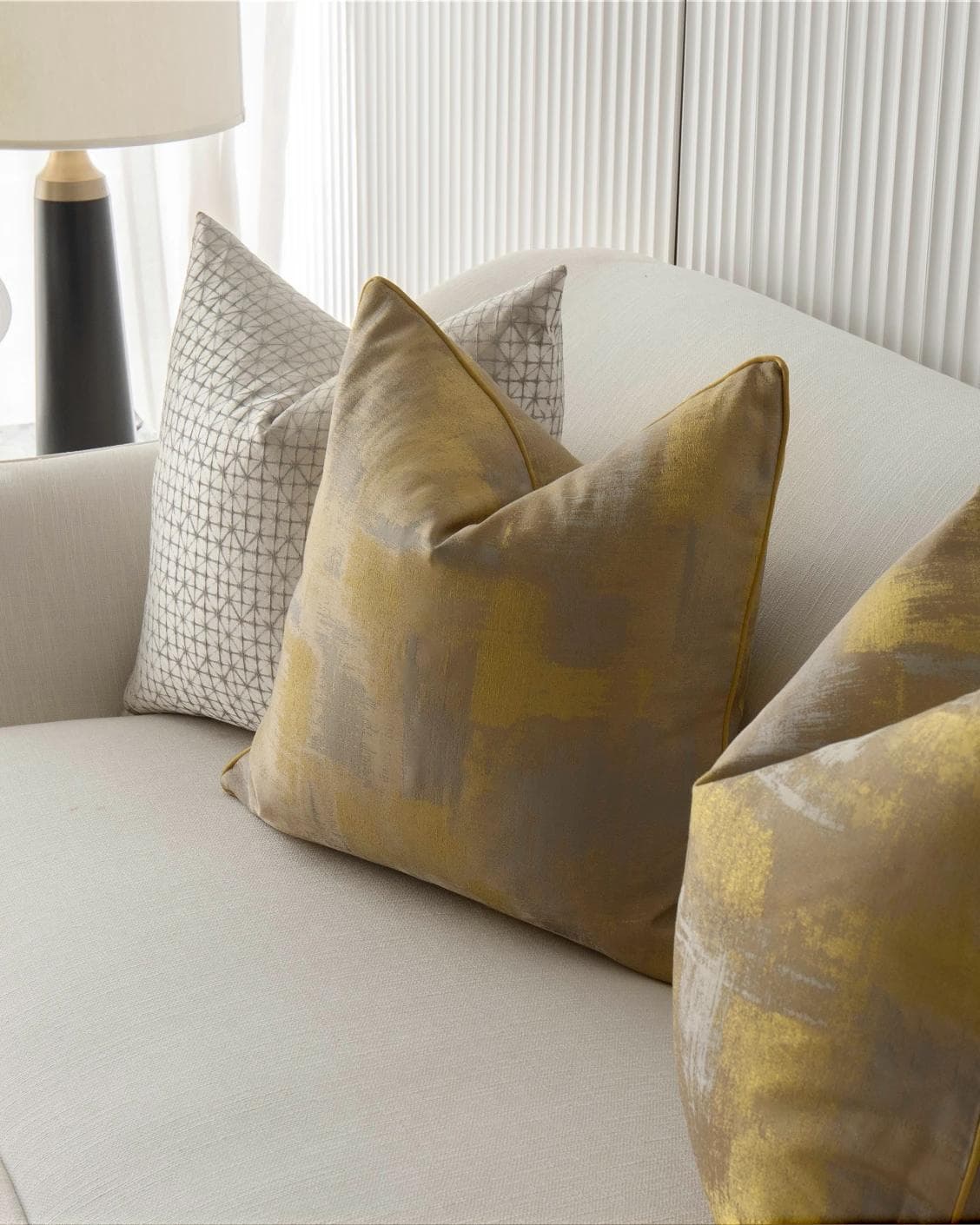 Gustave Bundle cushion in silver and gold, shown in a product right view as image 5