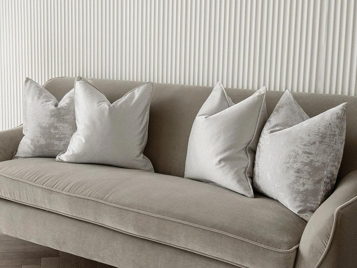 Colin Bundle cushion in silver and grey, shown in a lifestyle right view as image 2