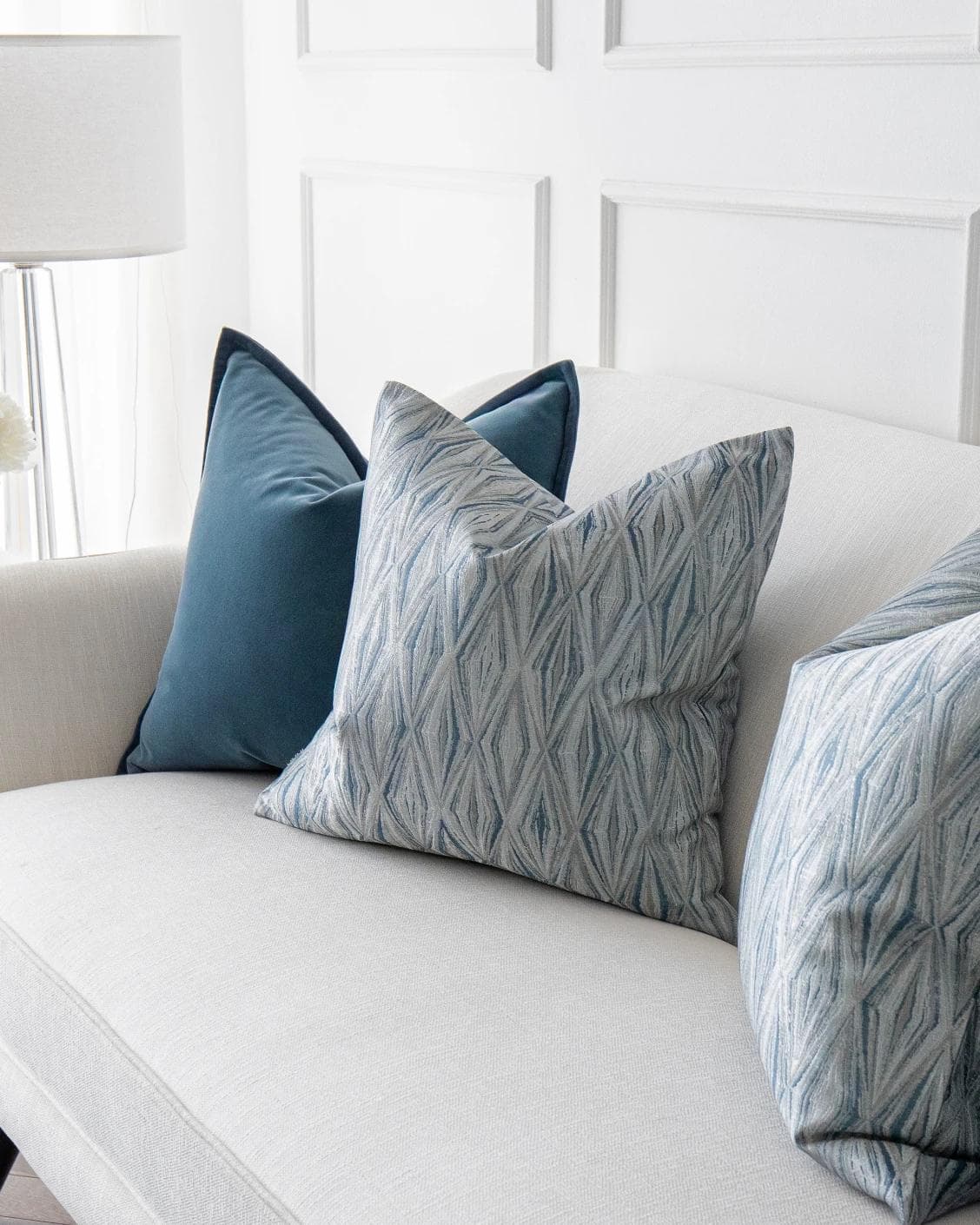 Luke Bundle cushion in silver and blue, shown in a product right view as image 5