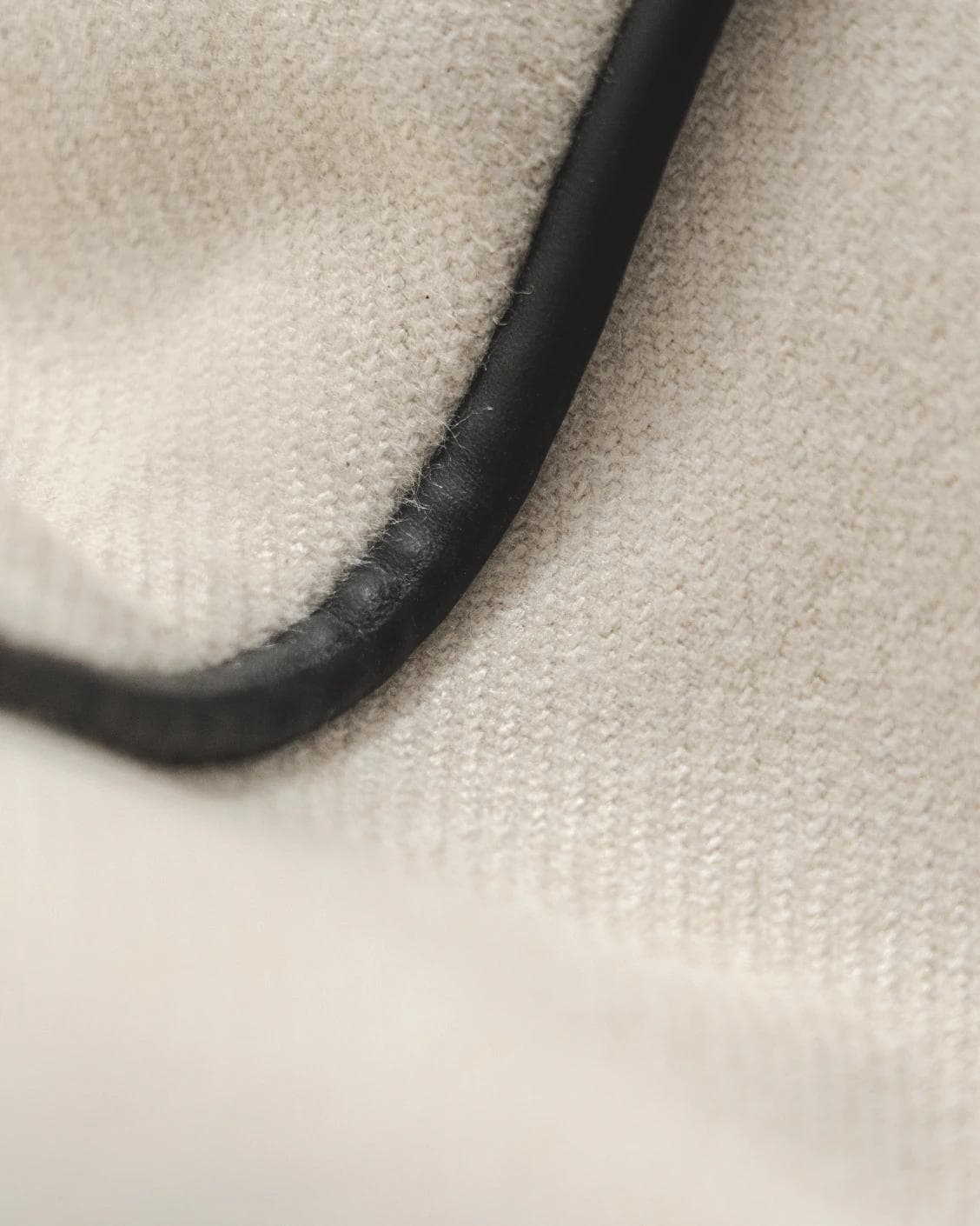 Silvie Bianca II cushion in off white, shown in a product close-up as image 7