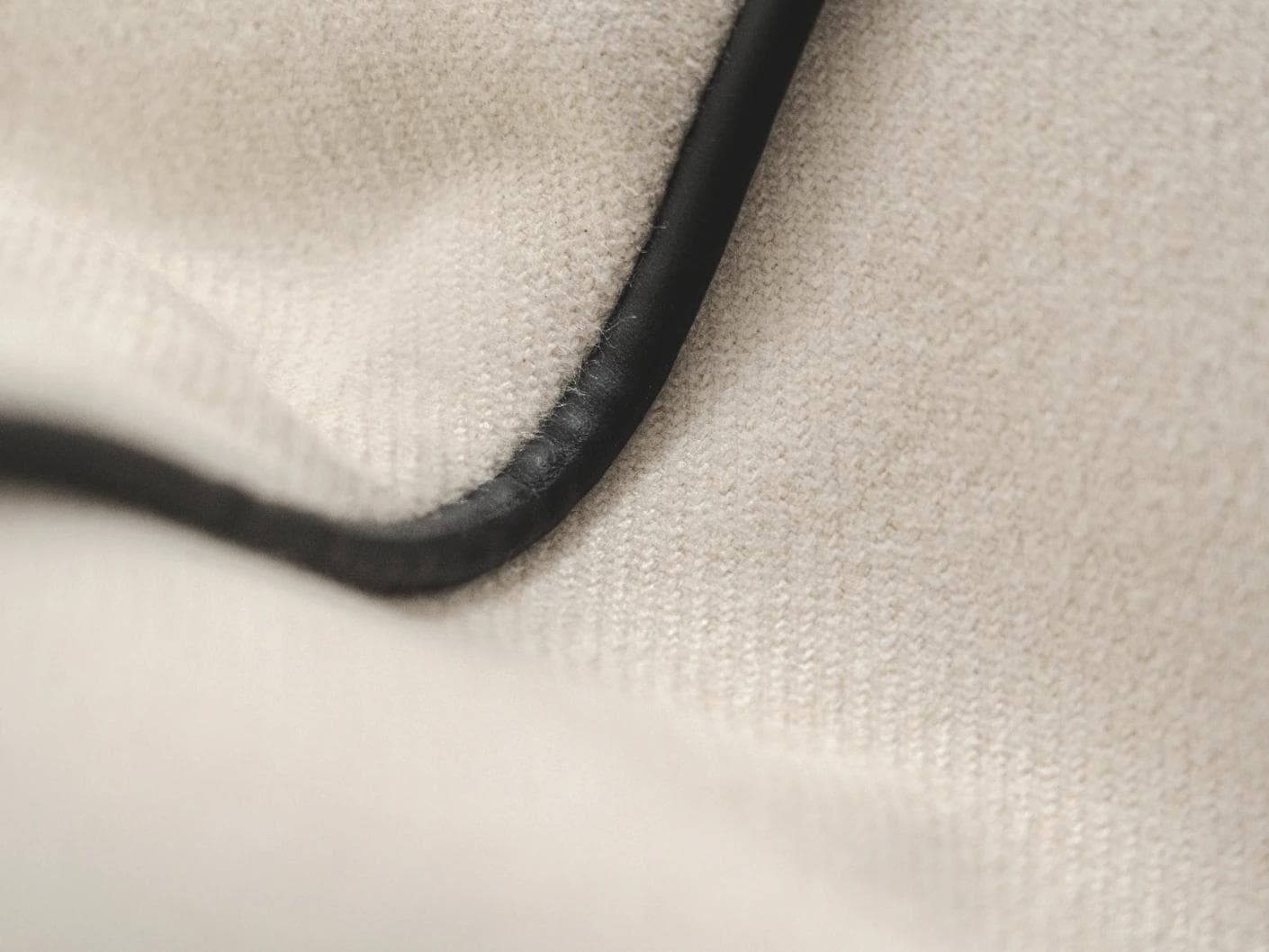 Silvie Bianca II cushion in off white, shown in a product close-up as image 7