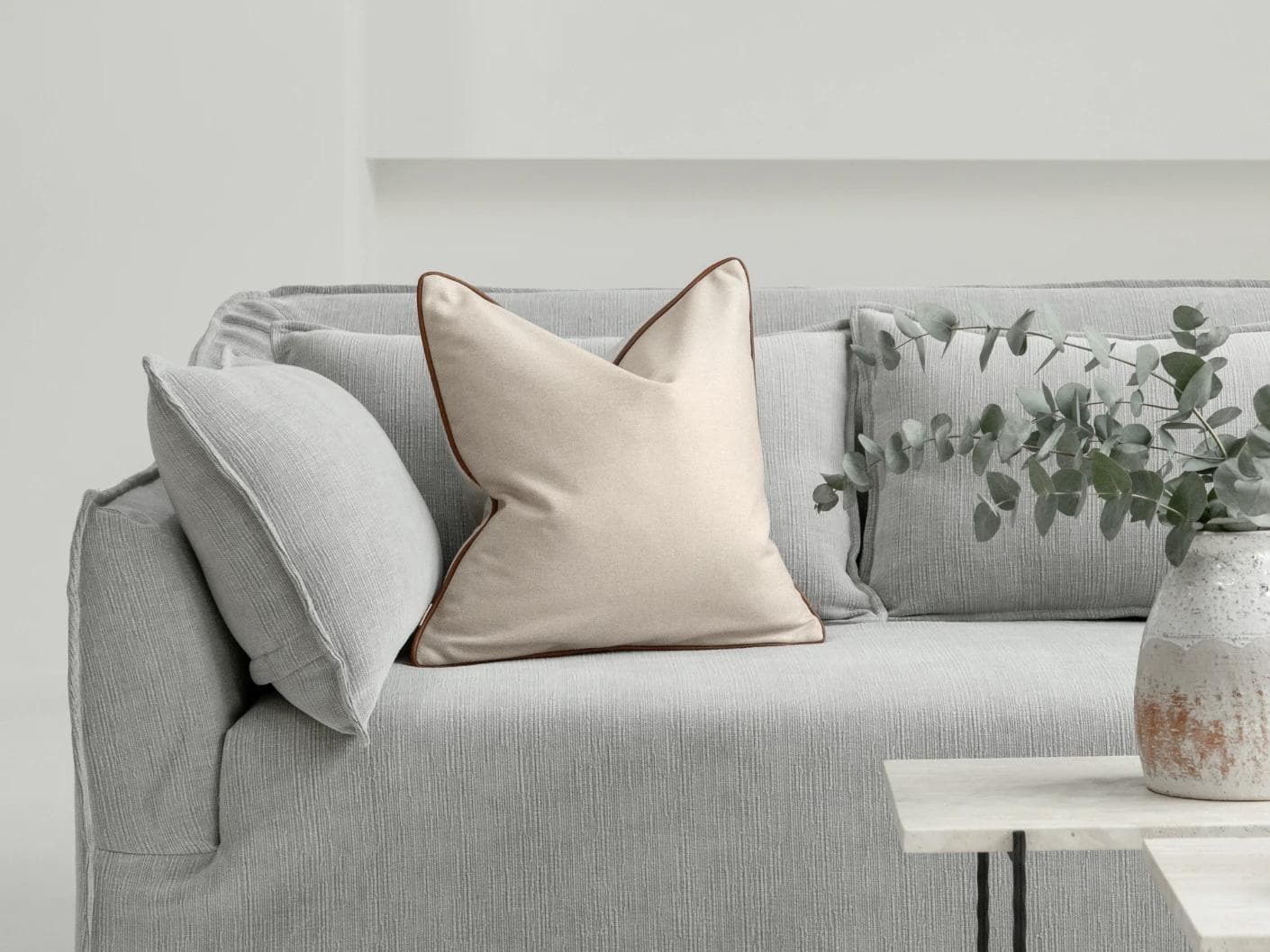 Silvie Klimt cushion in cream, shown in a lifestyle front view as image 4