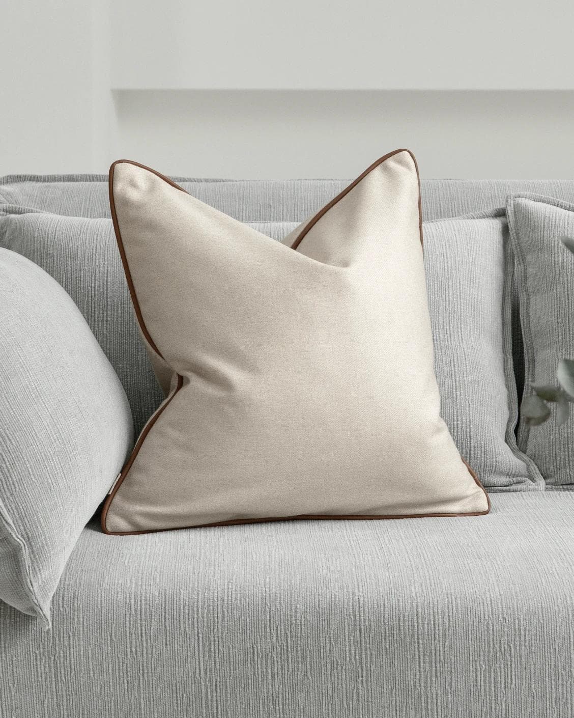 Silvie Klimt cushion in cream, shown in a lifestyle front view as image 2