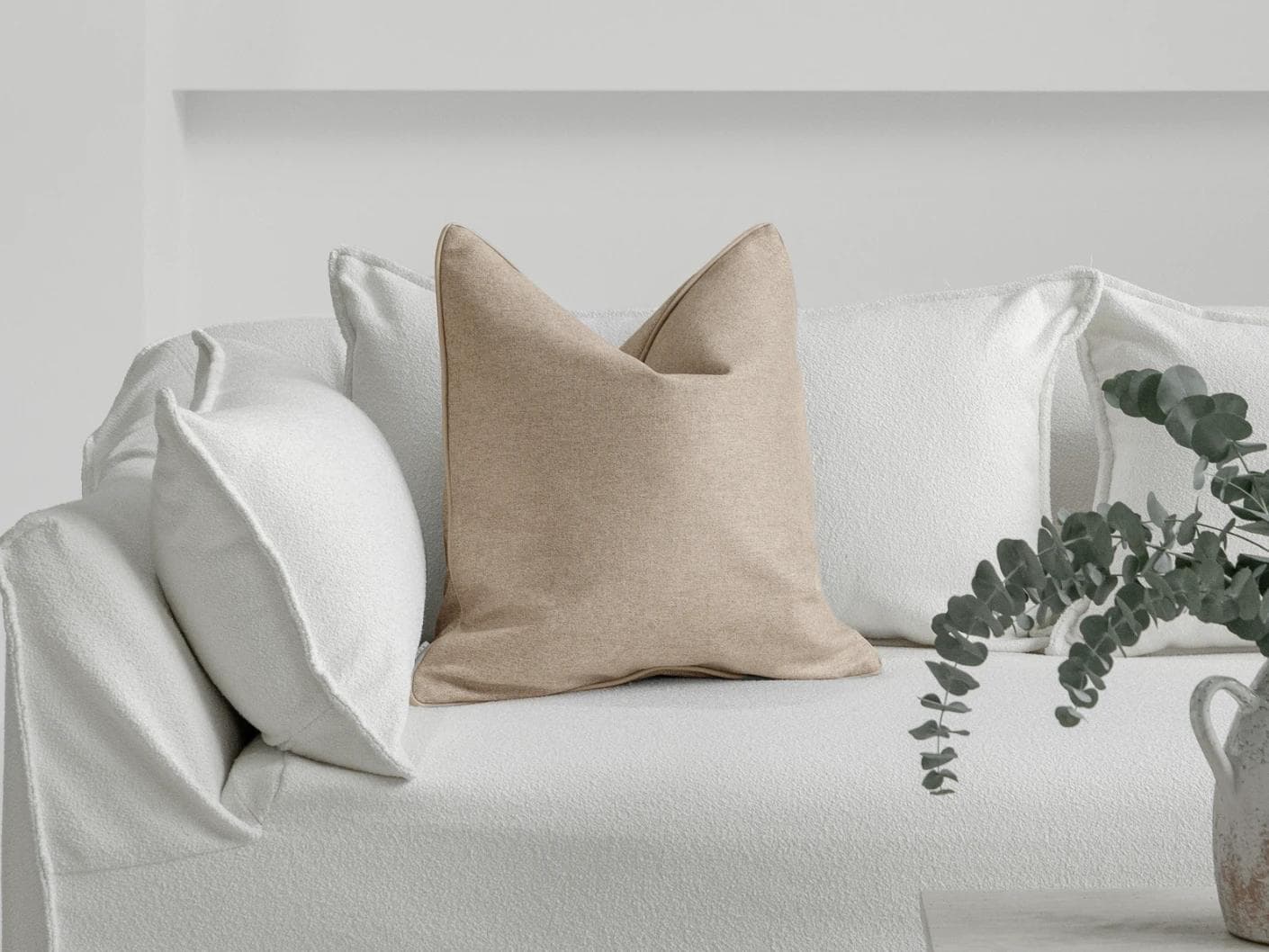 Silvie Laurent cushion in taupe, shown in a lifestyle front view as image 4