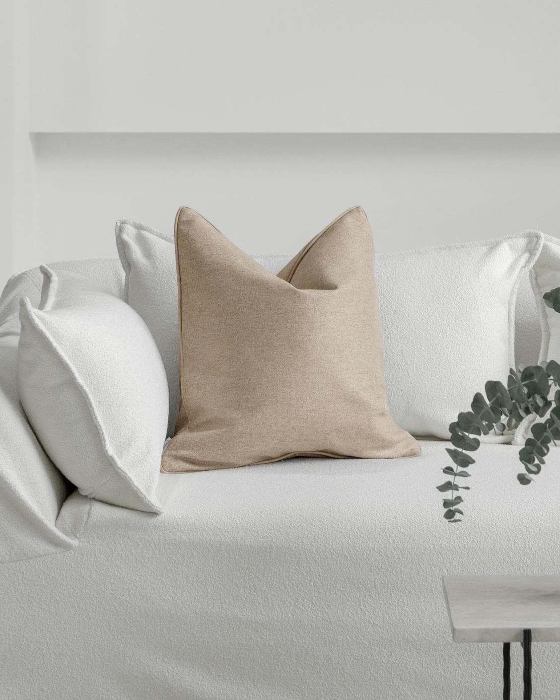 Silvie Laurent cushion in taupe, shown in a lifestyle front view as image 4