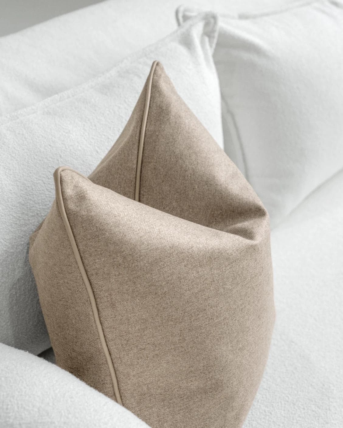 Silvie Laurent cushion in taupe, shown in a lifestyle top view as image 5