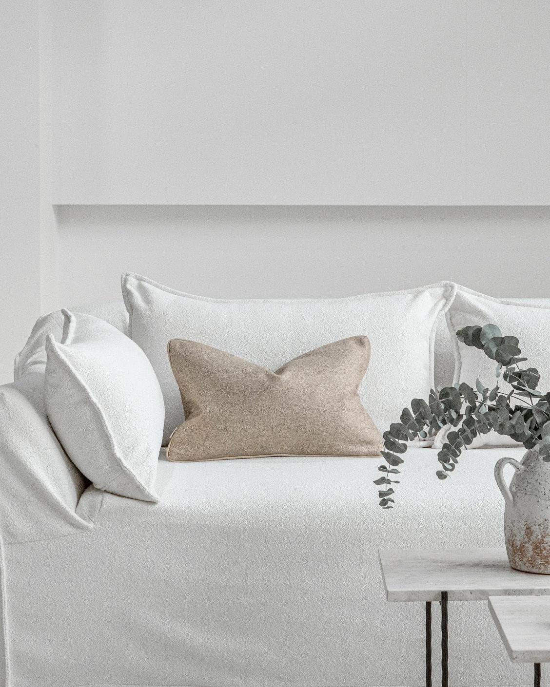 Silvie Laurent II cushion in taupe, shown in a lifestyle front view as image 4