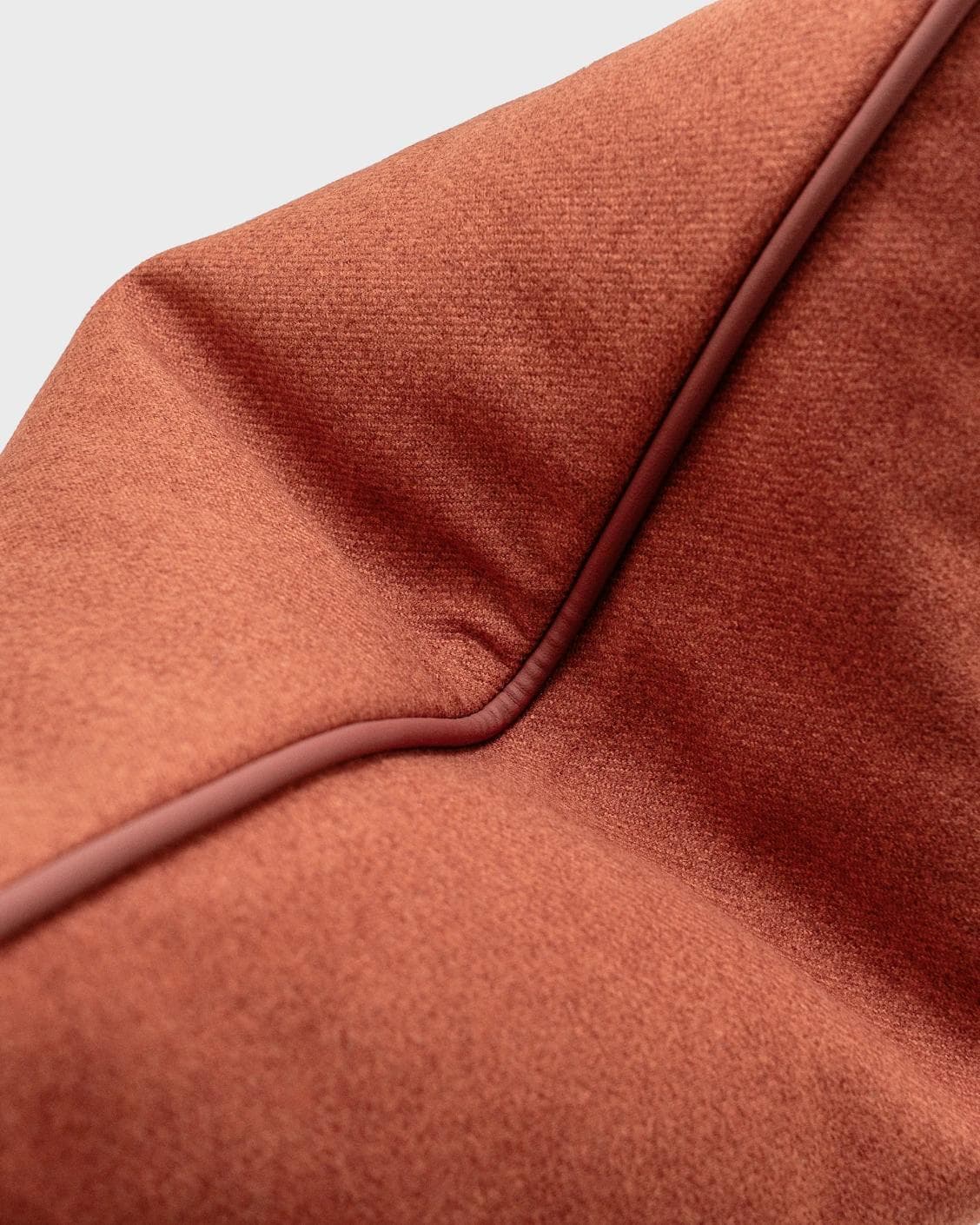 Silvie Scarlet cushion in orange, shown in a product top view as image 9