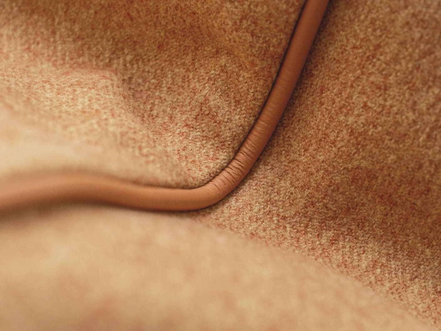 Silvie Tangelo cushion in rust, shown in a product close-up as image 6