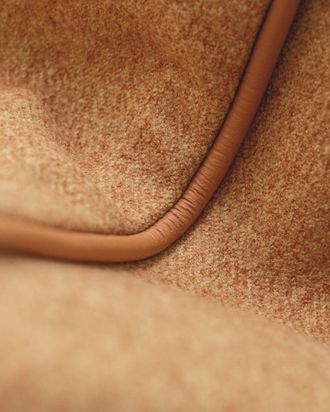 Silvie Tangelo cushion in rust, shown in a product close-up as image 6