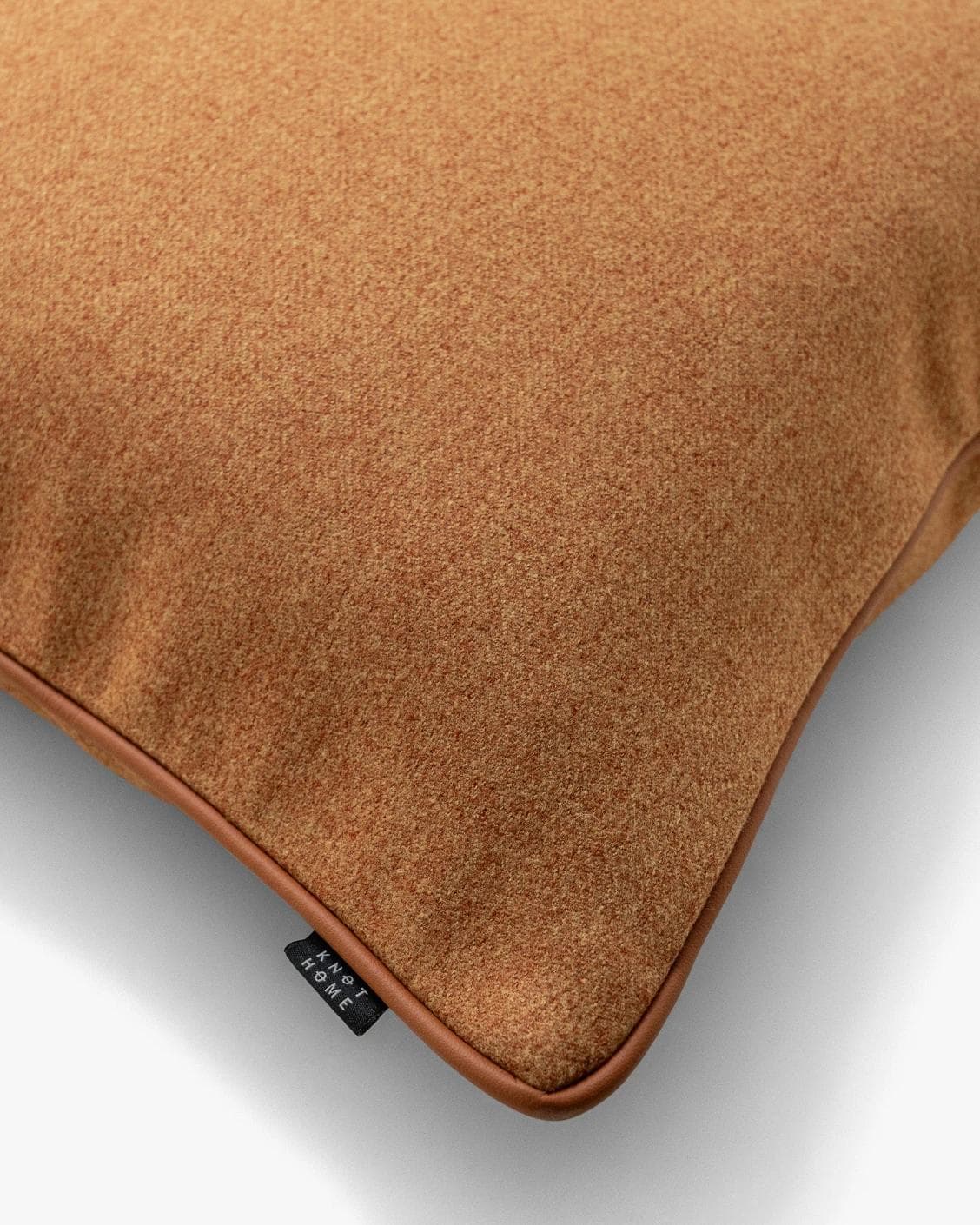 Silvie Tangelo cushion in rust, shown in a product top view as image 8