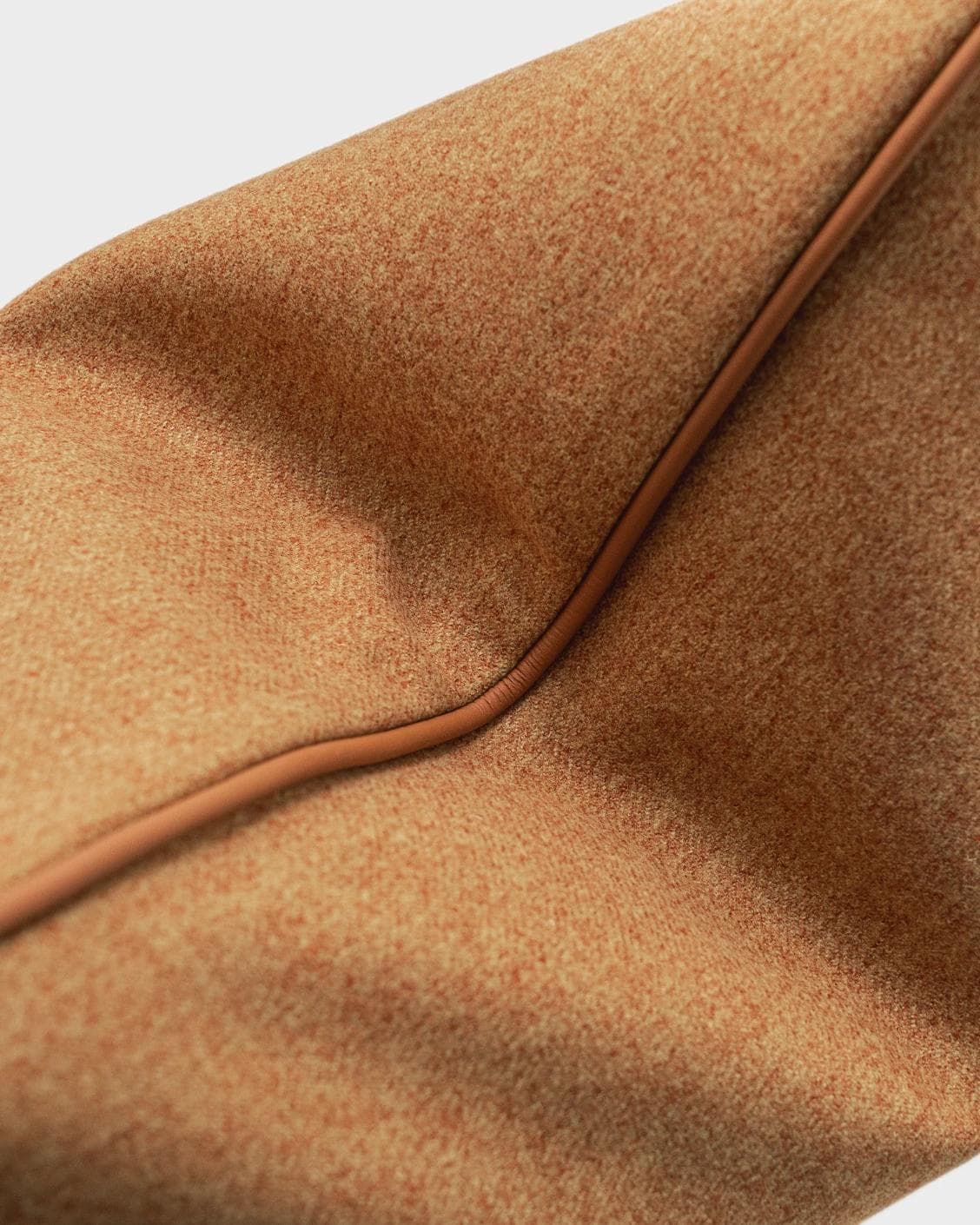 Silvie Tangelo cushion in rust, shown in a product top view as image 9