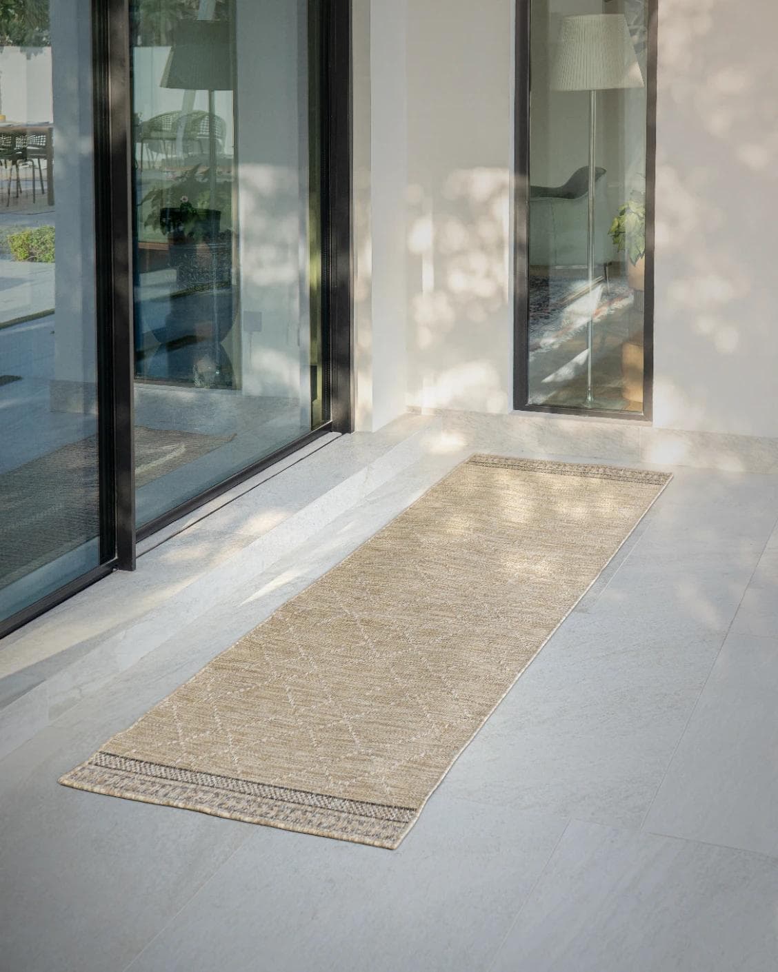 Solana Dune Runners carpet in brown, shown in a lifestyle front view