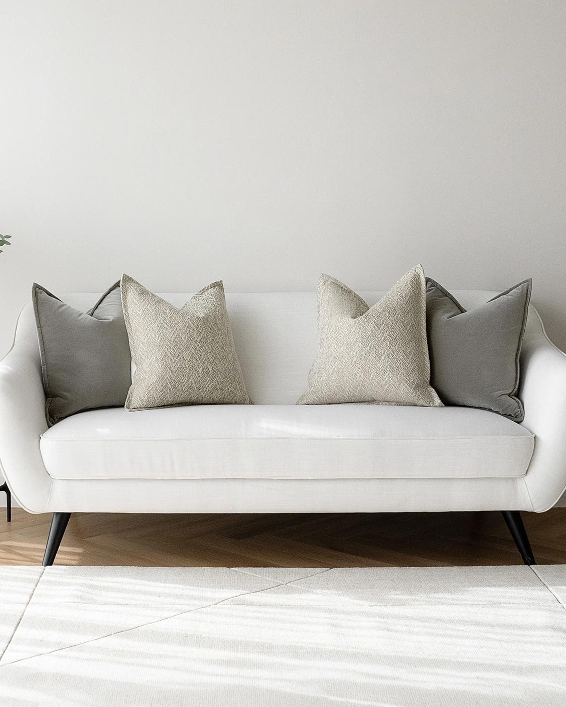 Sophie Bundle cushion in grey and beige, shown in a lifestyle front view as image 4