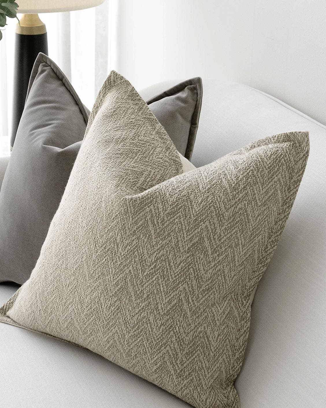 Sophie Bundle cushion in grey and beige, shown in a lifestyle right view as image 5