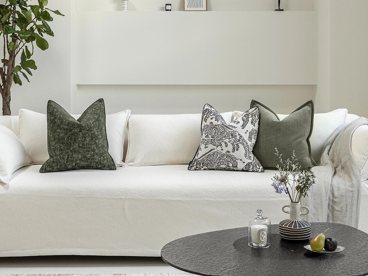 Sovi Bundle cushion in black and white, shown in a lifestyle front view as image 4