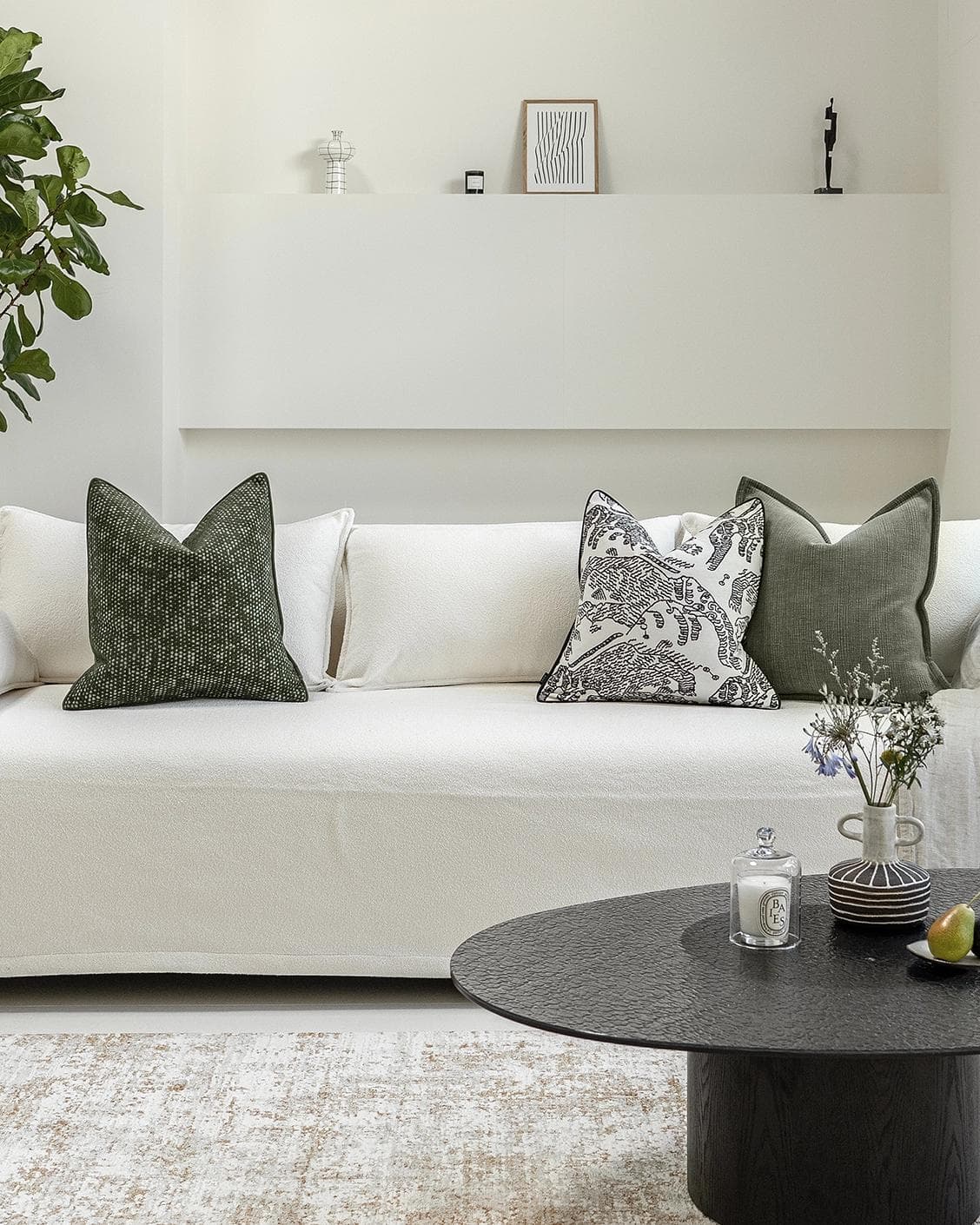 Sovi Bundle cushion in black and white, shown in a lifestyle front view as image 4