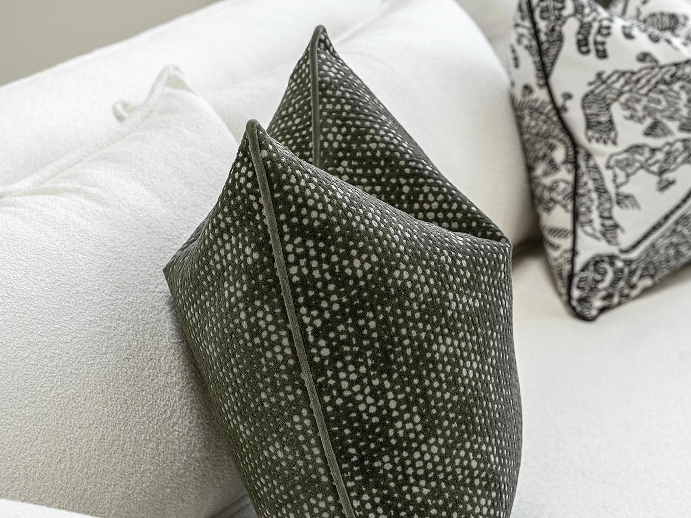 Sovi Bundle cushion in black and white, shown in a product left view as image 6