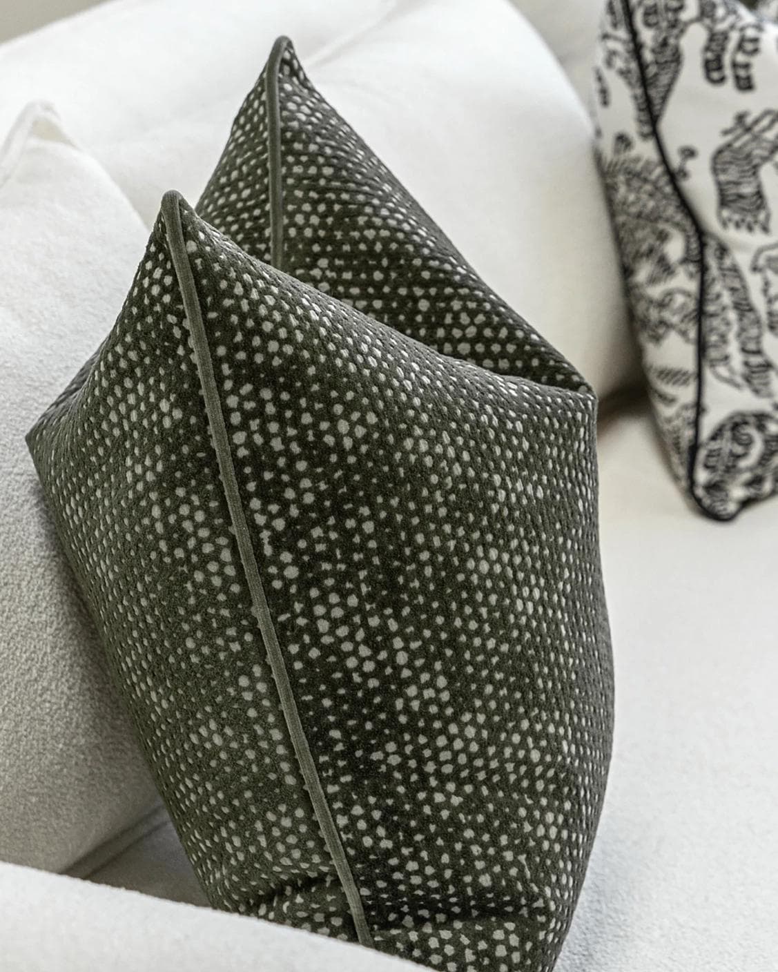 Sovi Bundle cushion in black and white, shown in a product left view as image 7