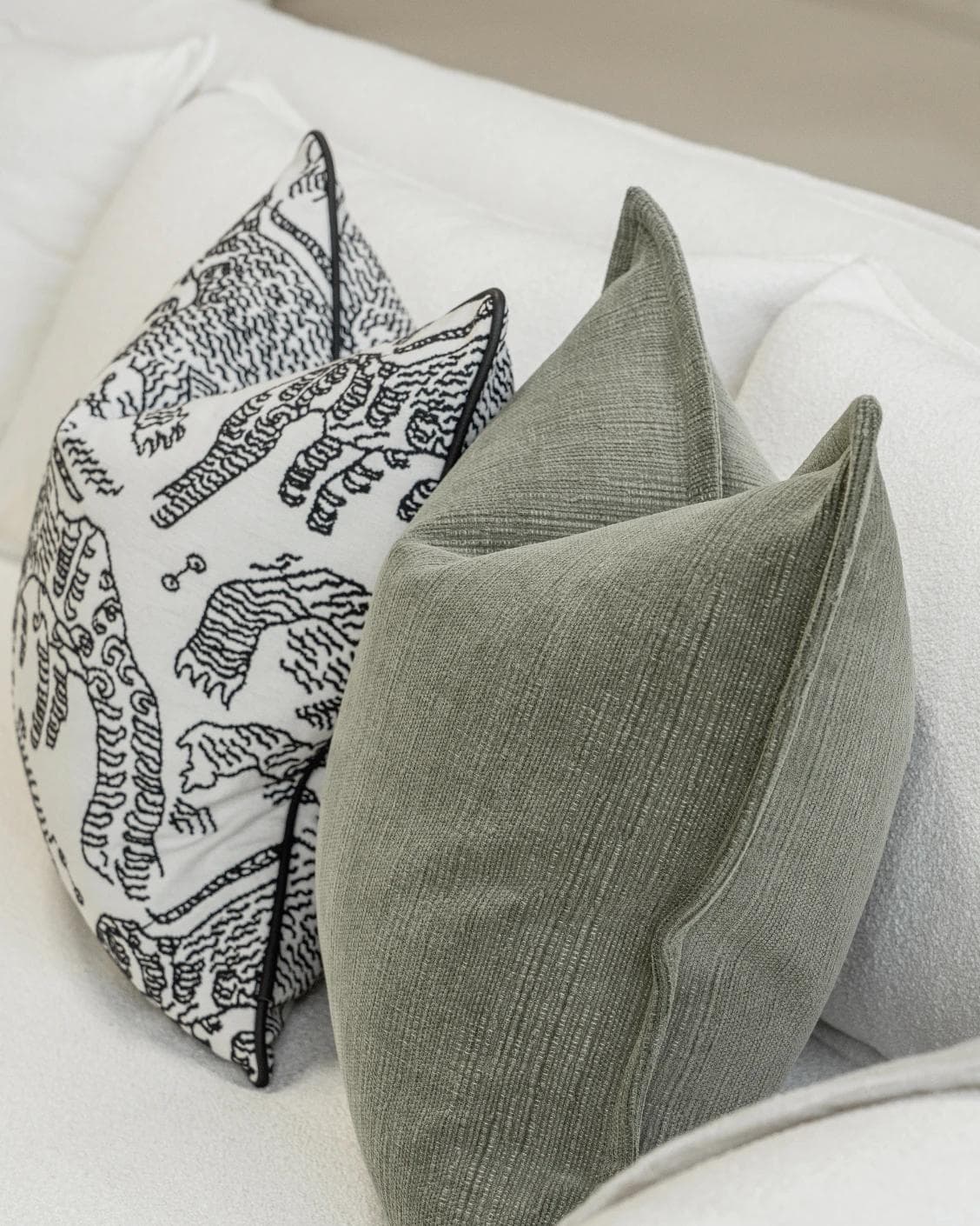 Sovi Bundle cushion in black and white, shown in a product right view as image 8