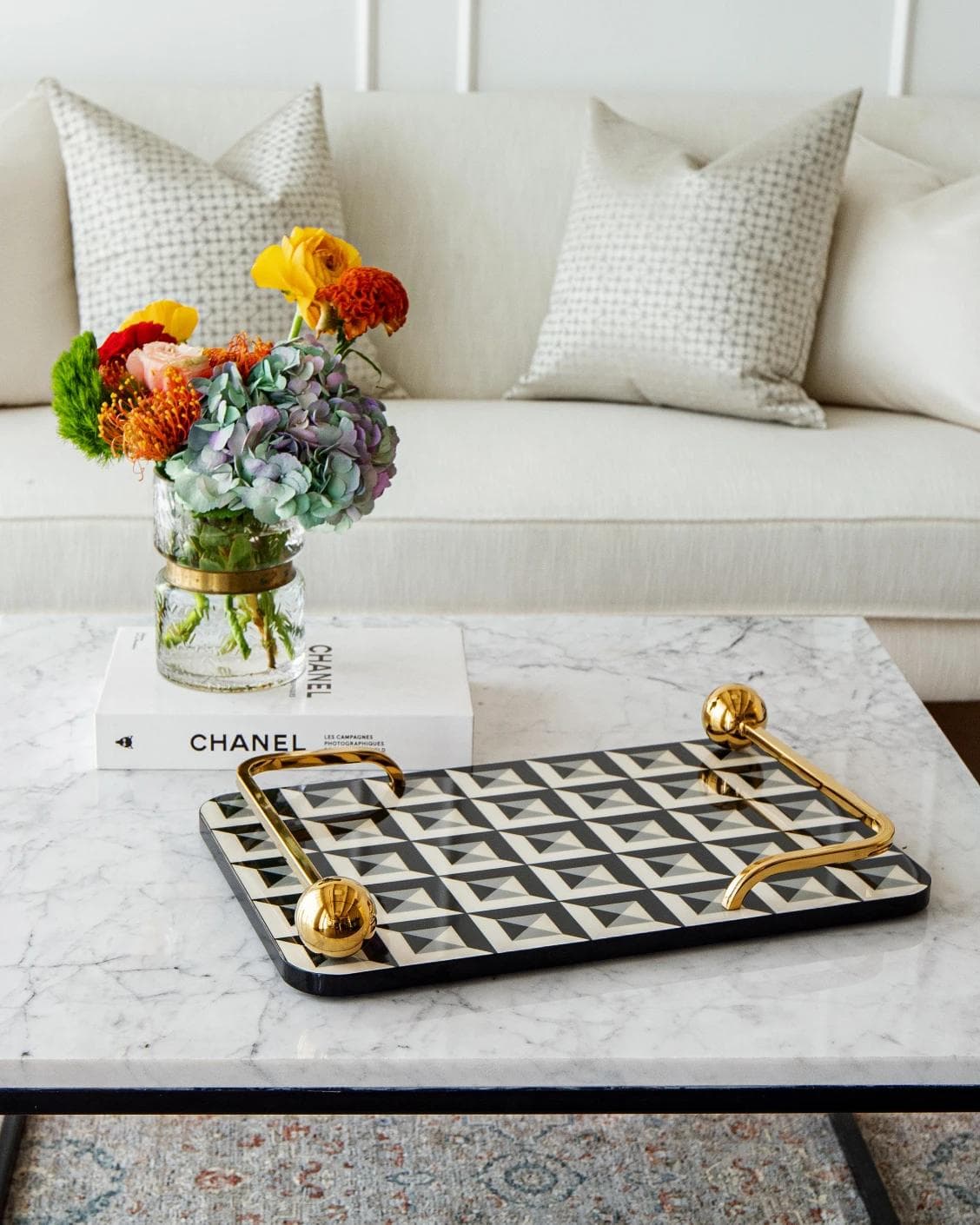 Stephen Bandiagara trays in black and gold, shown in a lifestyle front view as image 2