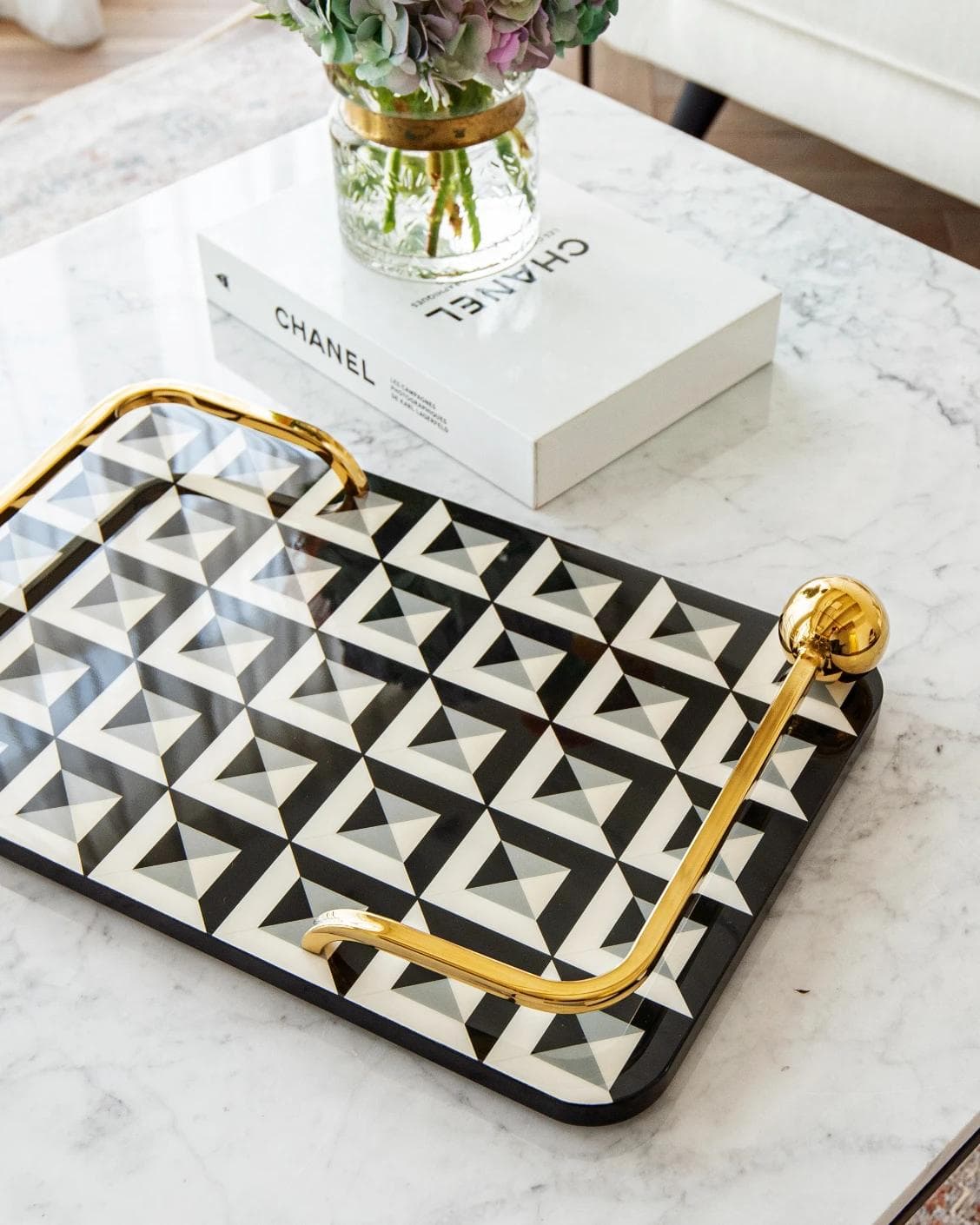 Stephen Bandiagara trays in black and gold, shown in a lifestyle top view as image 7