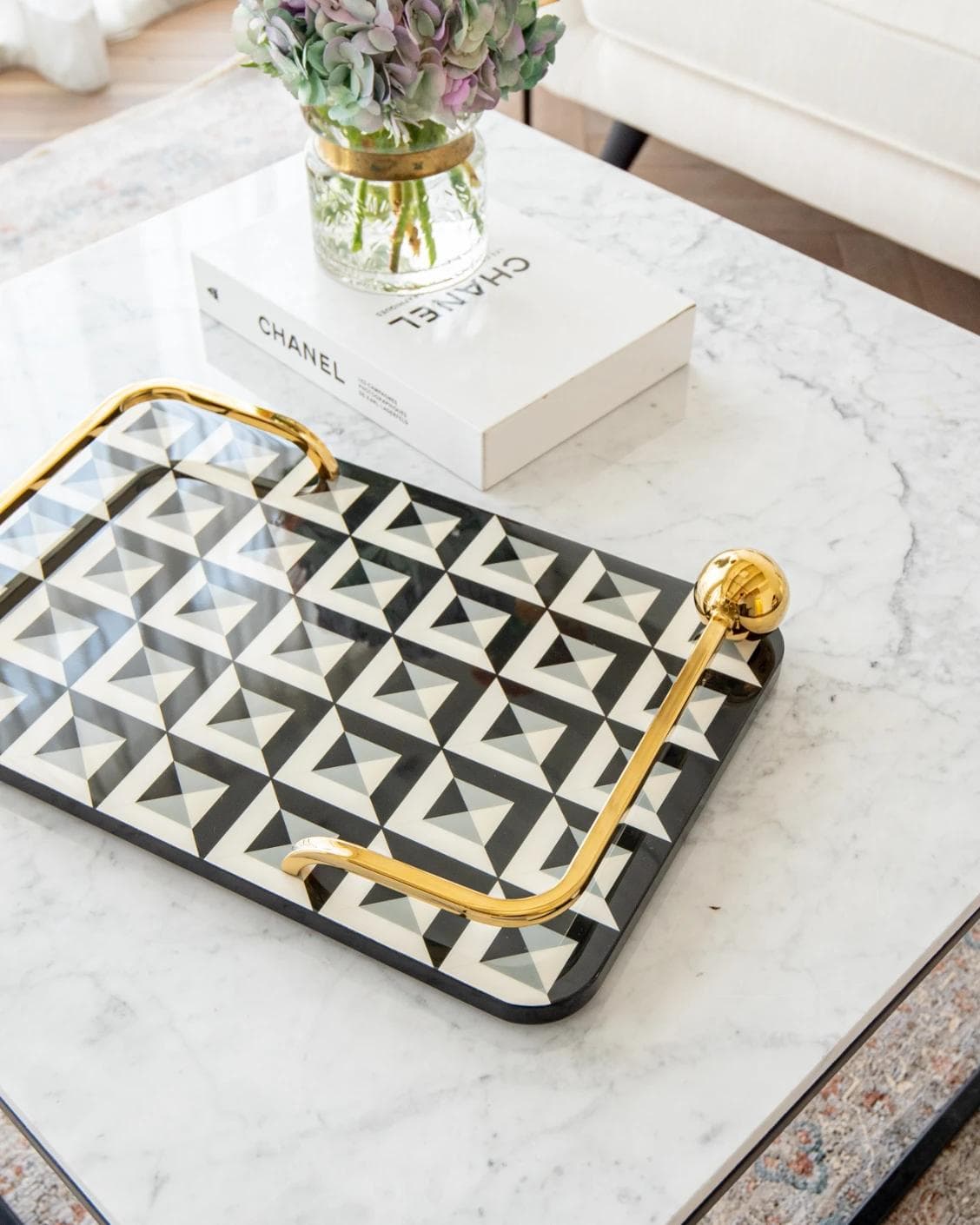Stephen Bandiagara trays in black and gold, shown in a lifestyle top view as image 8