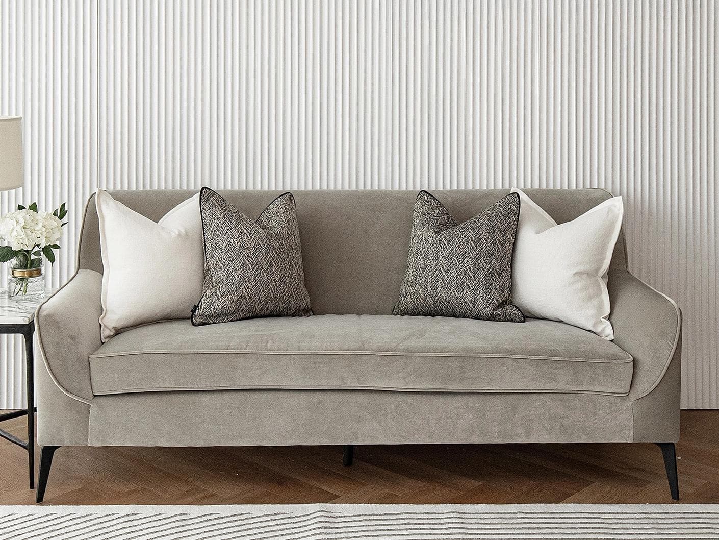 Rusman Bundle cushion in black and white, shown in a lifestyle front view as image 2