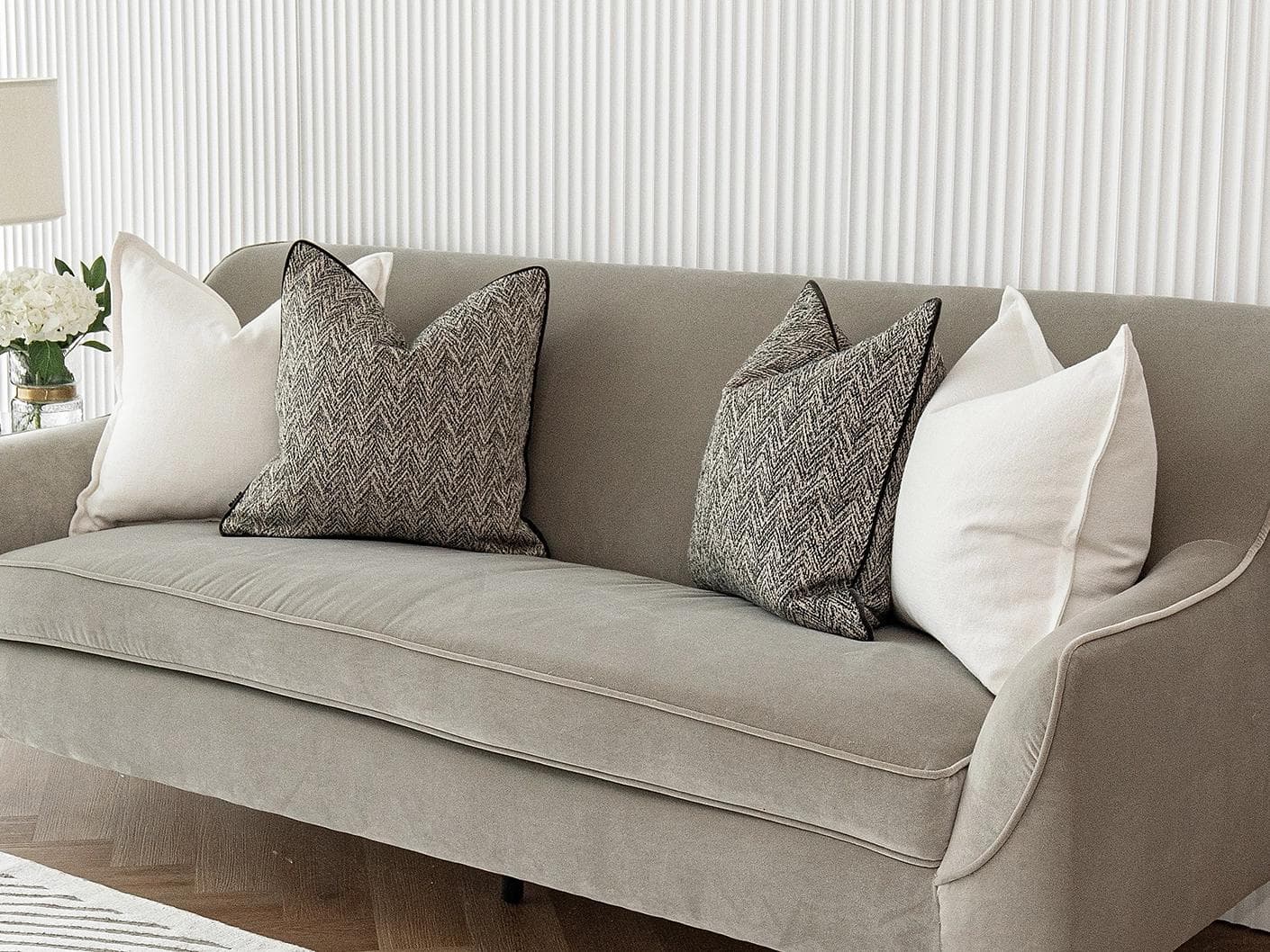 Rusman Bundle cushion in black and white, shown in a lifestyle right view as image 4