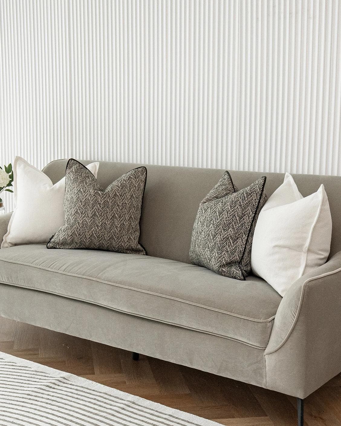 Rusman Bundle cushion in black and white, shown in a lifestyle right view as image 4