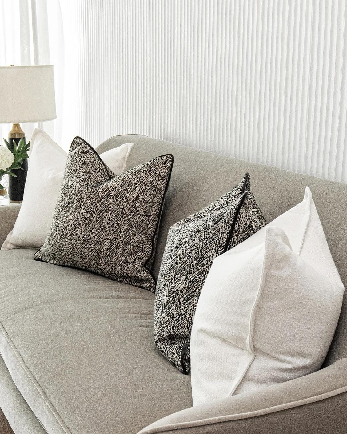Rusman Bundle cushion in black and white, shown in a product right view as image 7