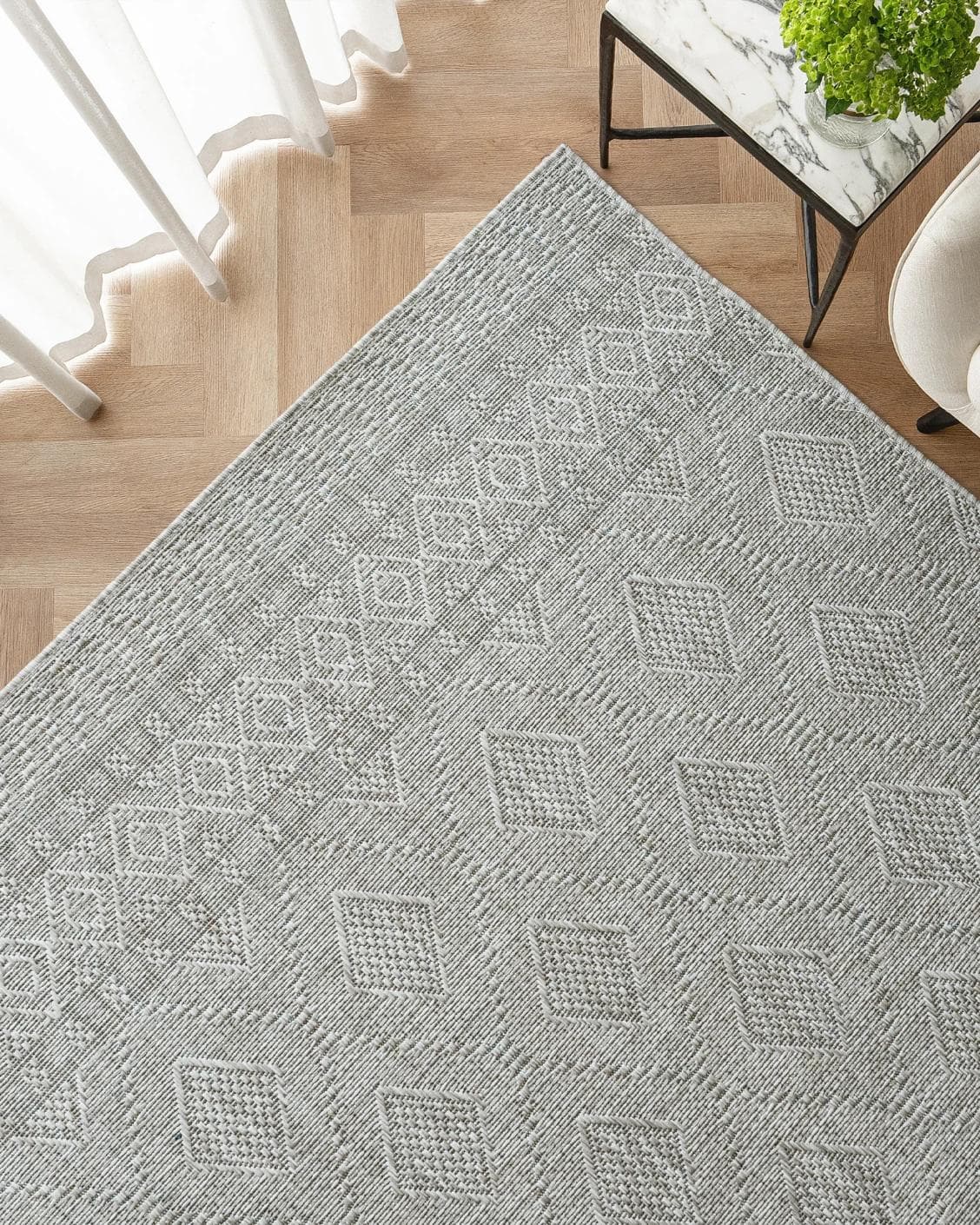 Summer Ashton carpet in grey, shown in a lifestyle top view as image 2