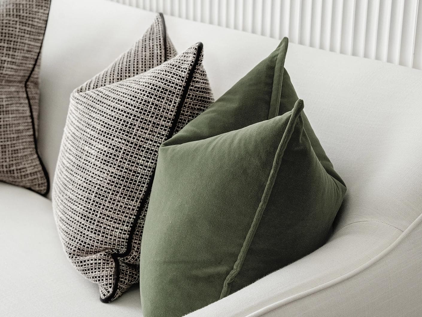 Susi Bundle cushion in green and black, shown in a product right view as image 7