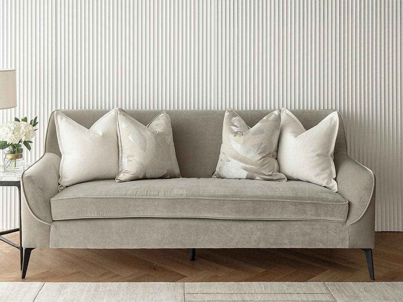 Landers Bundle cushion in white, silver and beige, shown in a lifestyle front view as image 2