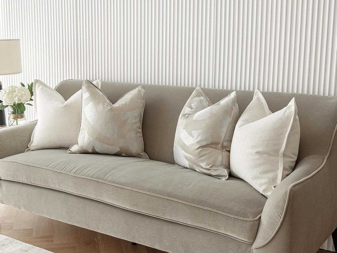 Landers Bundle cushion in white, silver and beige, shown in a lifestyle right view as image 4