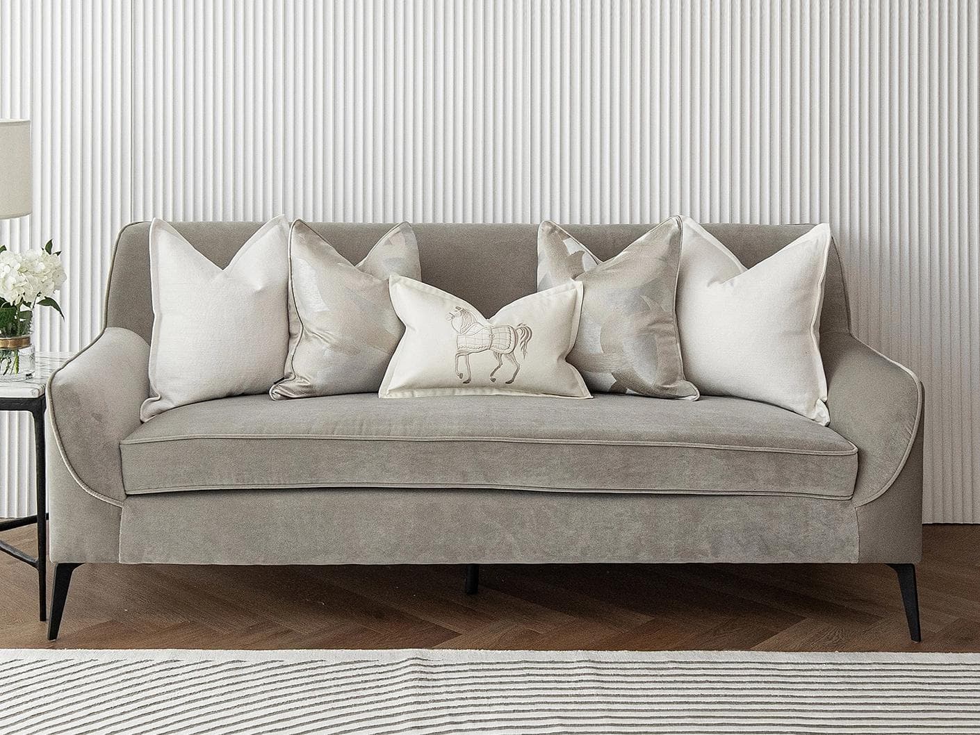 Honey Bundle cushion in white, shown in a lifestyle front view as image 2