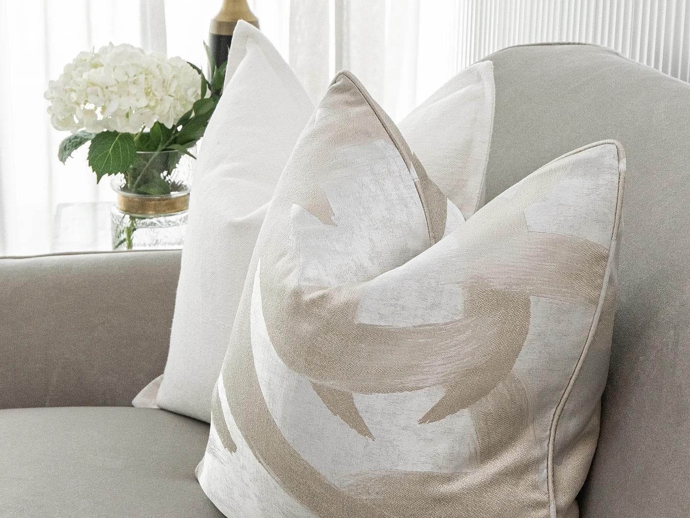 Honey Bundle cushion in white, shown in a lifestyle right view as image 4