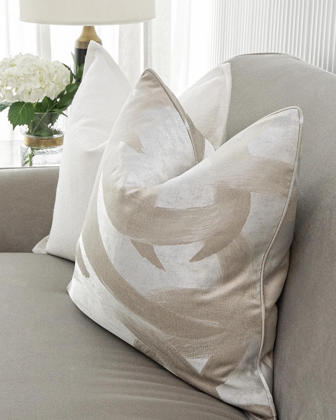 Honey Bundle cushion in white, shown in a lifestyle right view as image 4