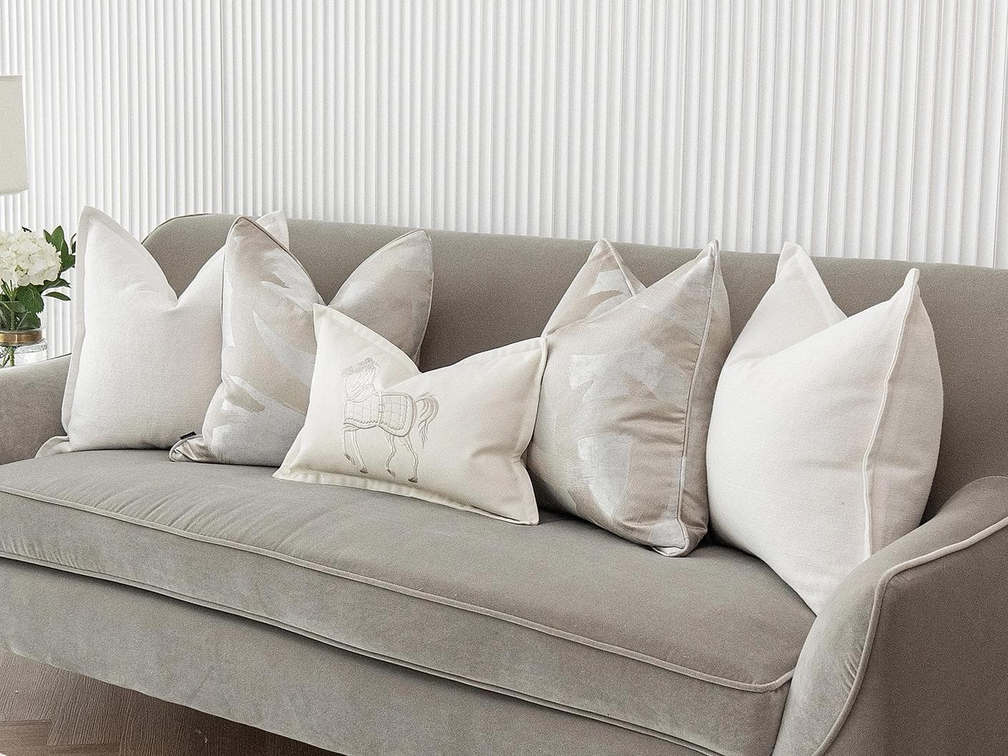 Honey Bundle cushion in white, shown in a lifestyle right view as image 5