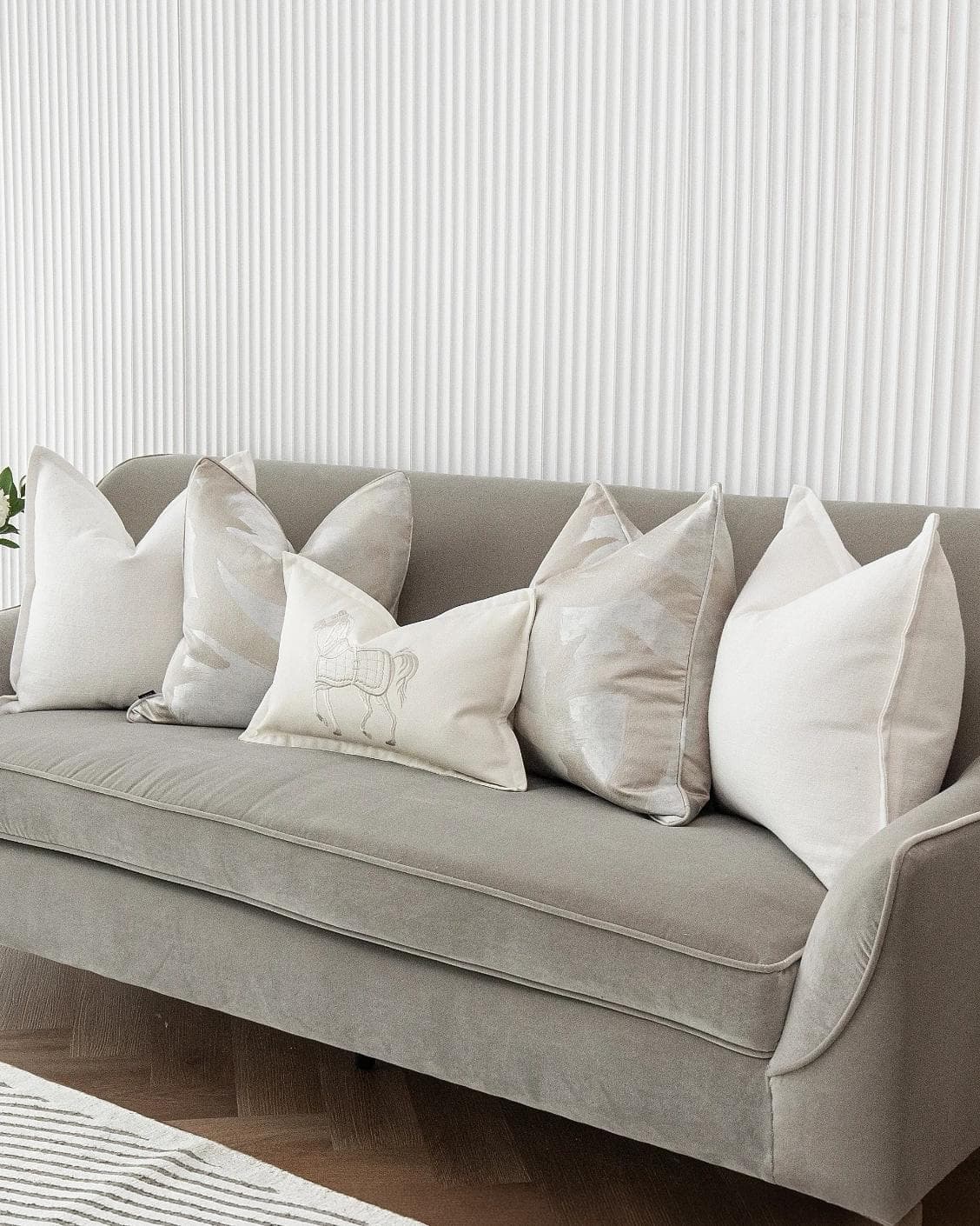 Honey Bundle cushion in white, shown in a lifestyle right view as image 5