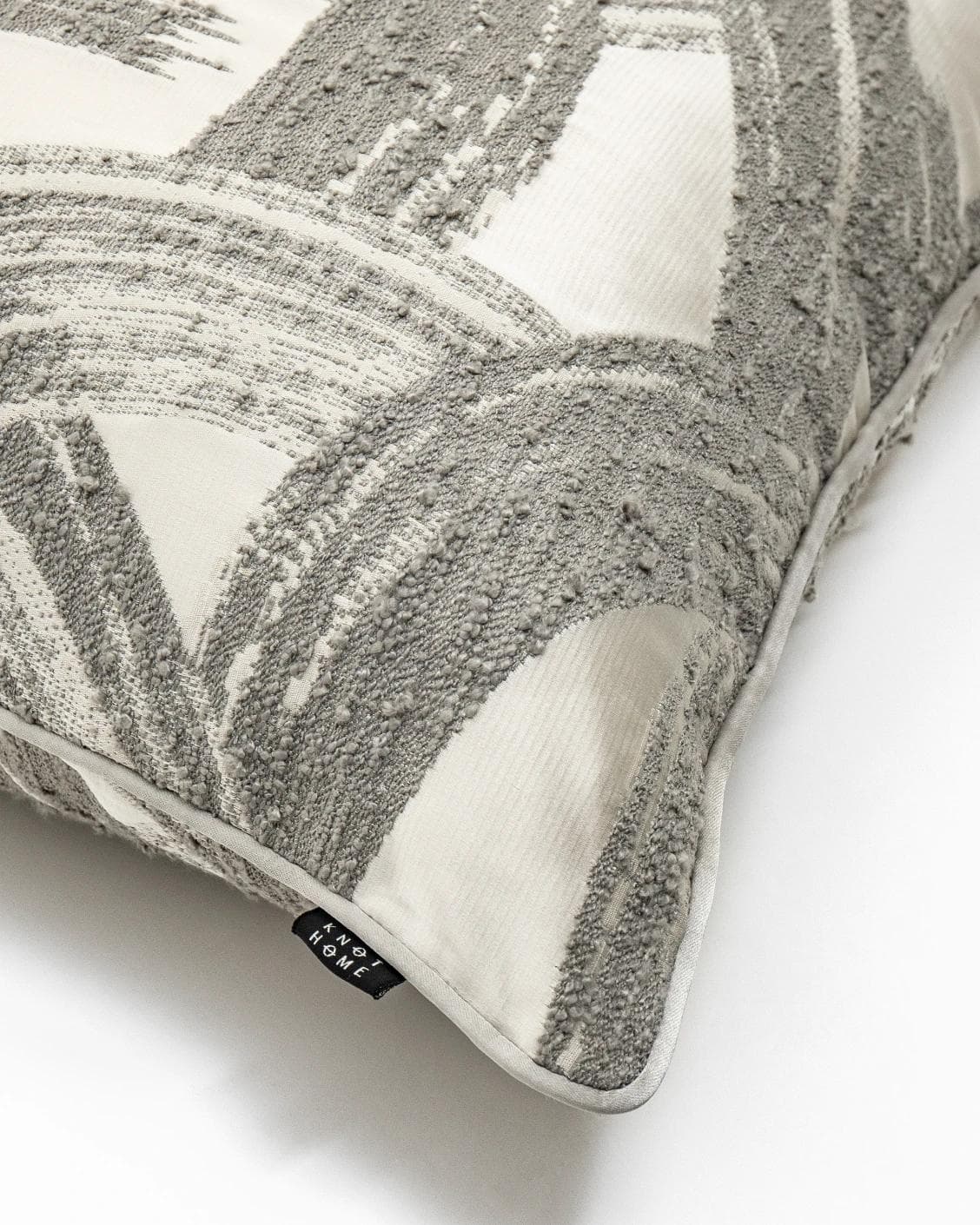 Tanya Laurent cushion in white and grey, shown in a product top view as image 7