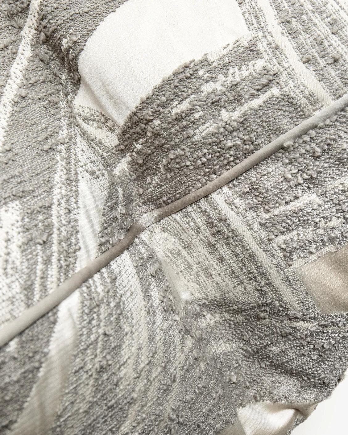 Tanya Laurent cushion in white and grey, shown in a product top view as image 8