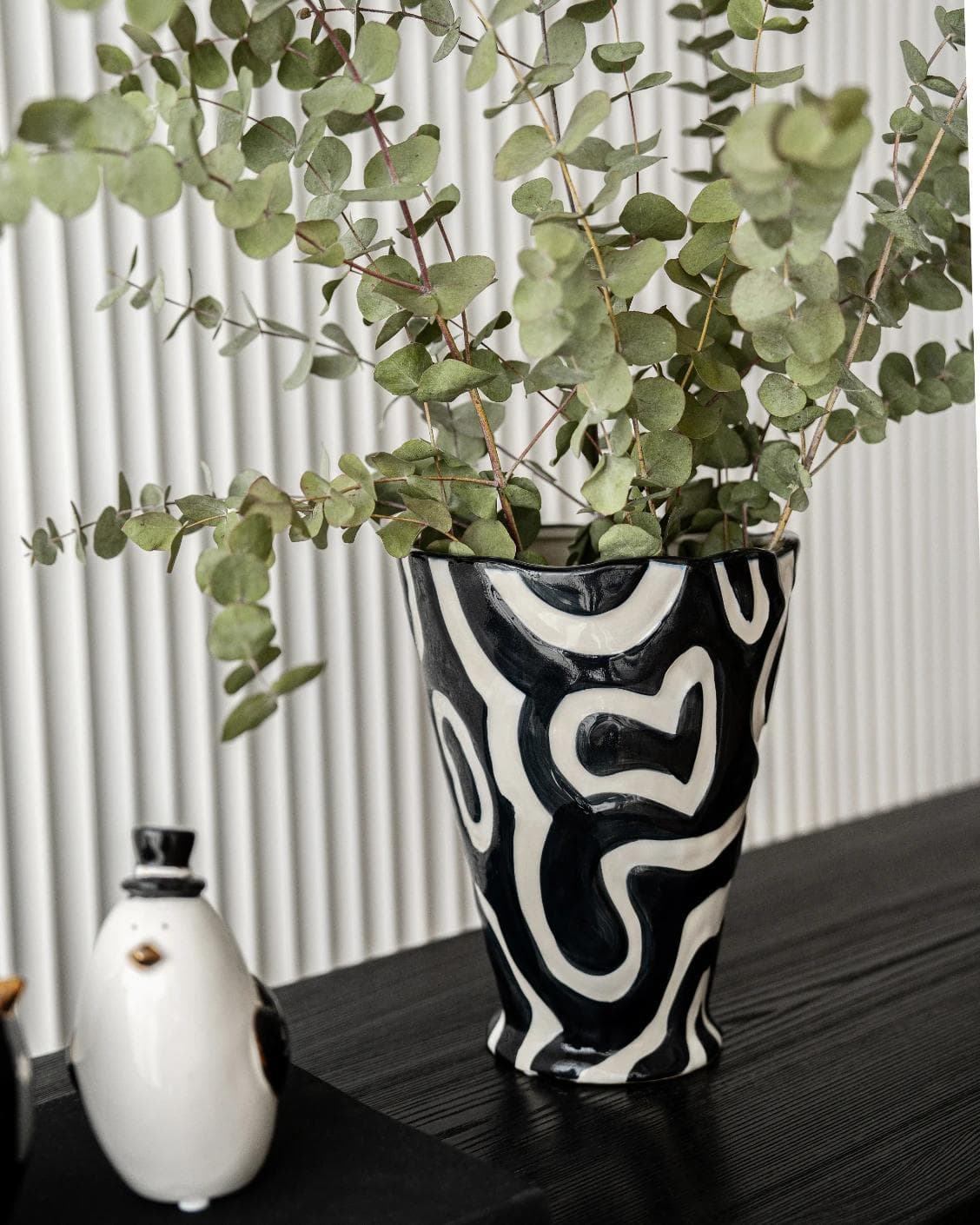 Tembo Arneson vases, shown in a lifestyle left view as image 7