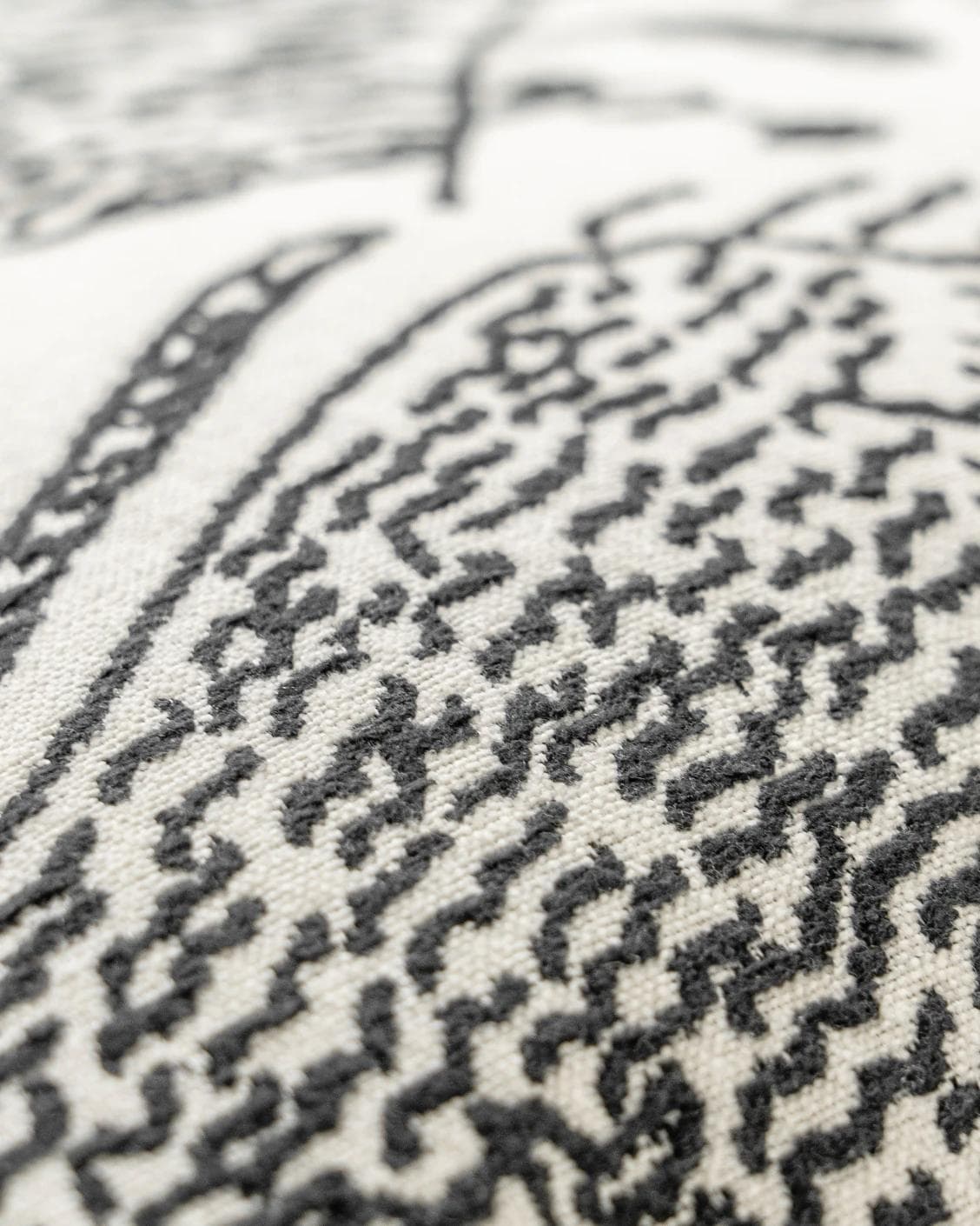 Tessa Steele cushion in ivory and charcoal, shown in a product close-up as image 6