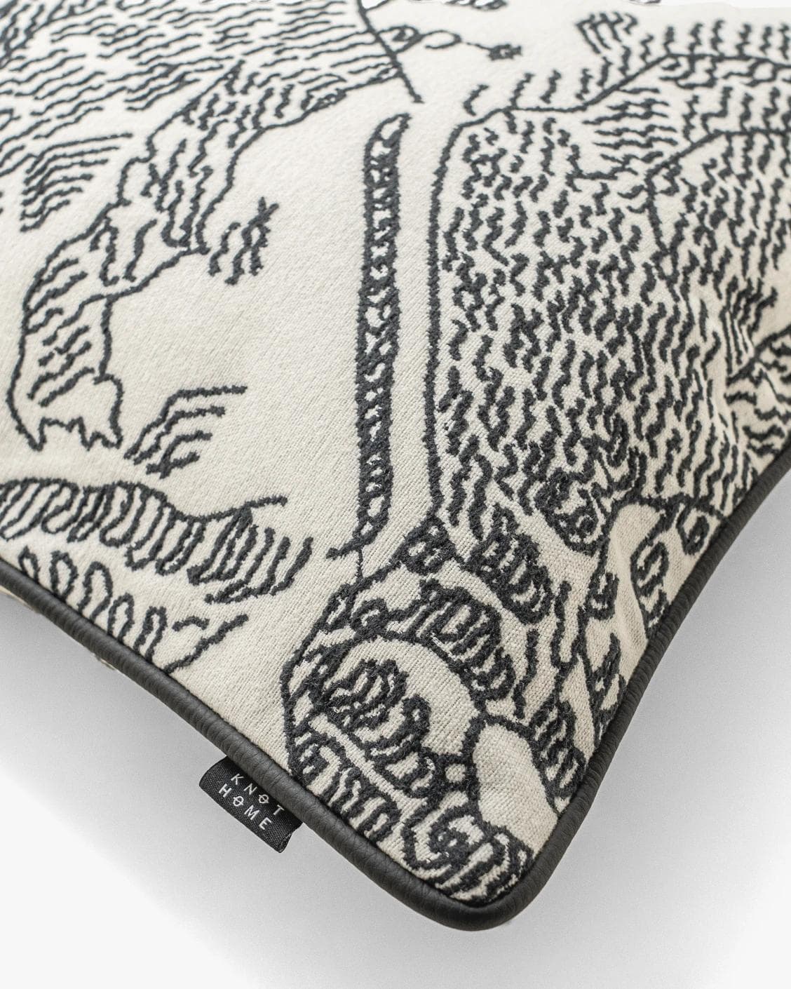 Tessa Steele cushion in ivory and charcoal, shown in a product top view as image 11