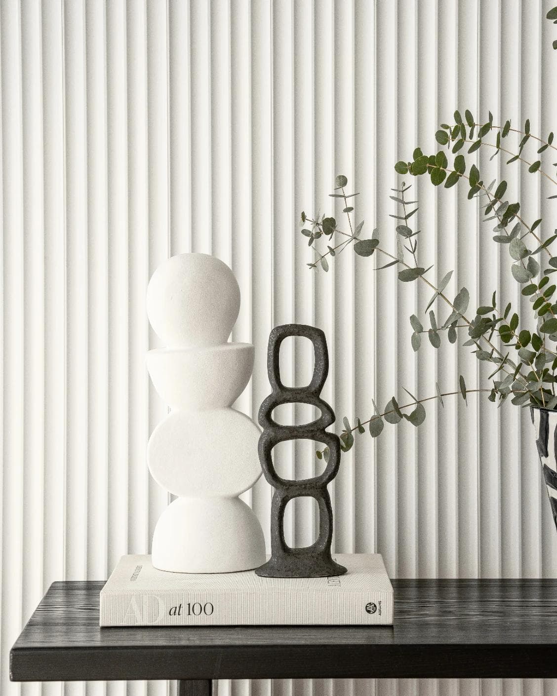 Tetra Laurian Bundle statues and sculptures in white and black, shown in a lifestyle front view as image 5