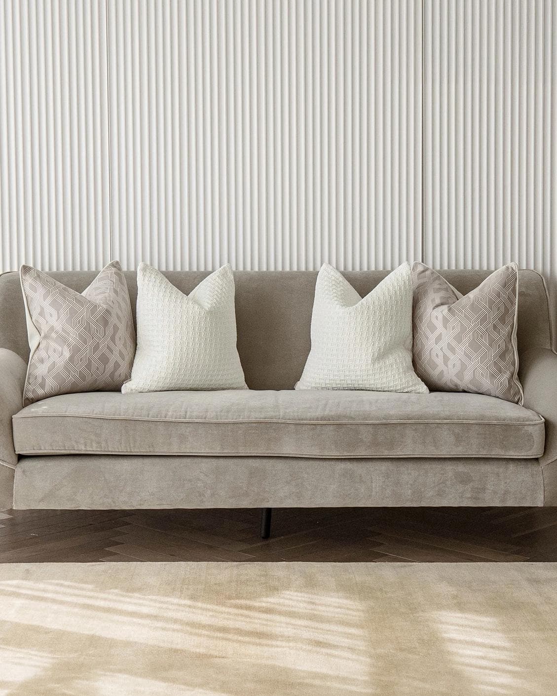 Shilo Bundle cushion in white and beige, shown in a lifestyle front view as image 4