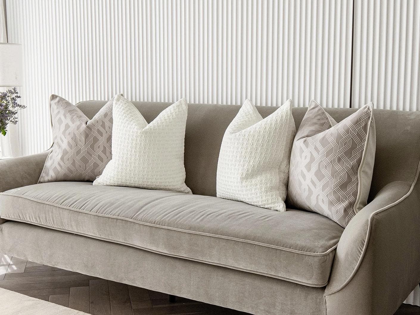 Shilo Bundle cushion in white and beige, shown in a lifestyle right view as image 2