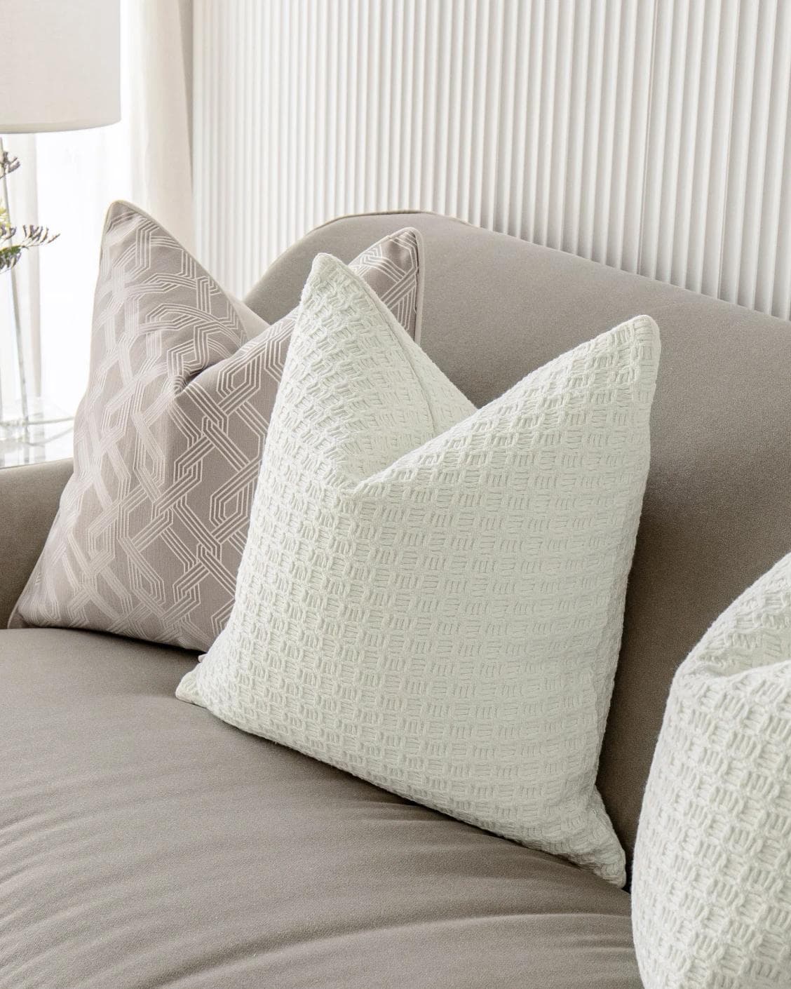 Shilo Bundle cushion in white and beige, shown in a product right view as image 5